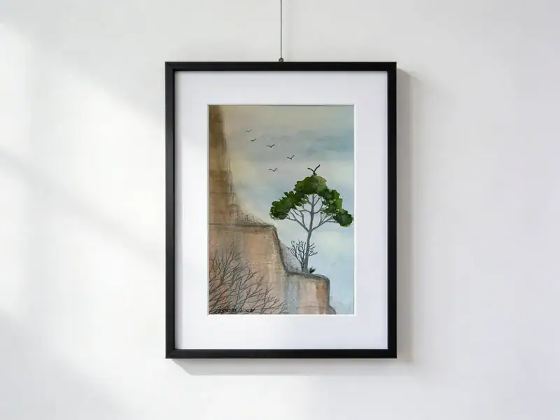 Acquarello di Gordana Majic con albero solitario in una piccola oasi su parete rocciosa, uccelli in volo in una valle desertica, formato 30 x 40 cm con paspartout