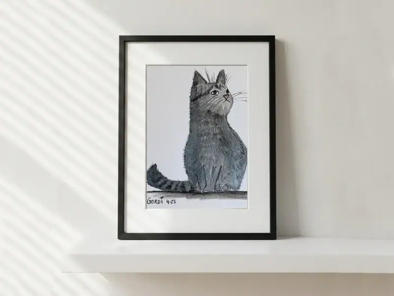 Oscar the Grey Cat, watercolor, ink, and pencil by Gordana Majic featuring a grey cat sitting with a curled tail and a curious gaze turned upwards on a light background.