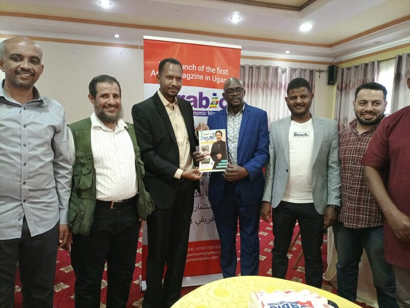 Arabic Economic magazine launches to boost trade and tourism between Uganda and Arab world 1. L-R 2nd Eng. Saed Ali of Beserene Rasturant, Badreldeen Khalafallha and Ramadan Sserunkuma launching the Arabic Econ Magazine.