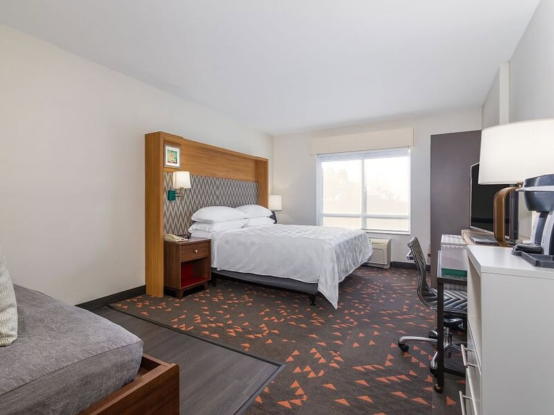 Family room at Holiday Inn Winter Haven with mini-fridge