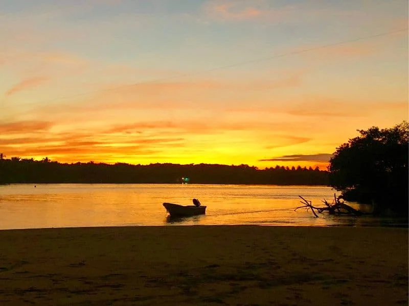 boat at sunset in chacahua mexico