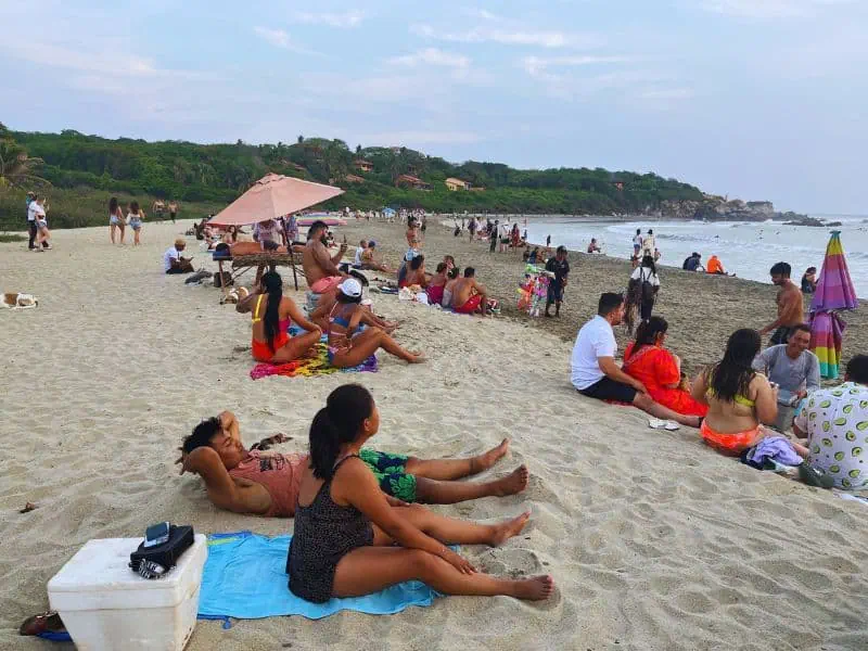 people on the beach for sunset at La Punta Puerto Escondido Oaxaca