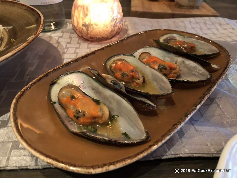 Lokhandwala Charlotte Street Mussels in lemon coriander butter Lokhandwala Charlotte Street Mussels in lemon coriander butter