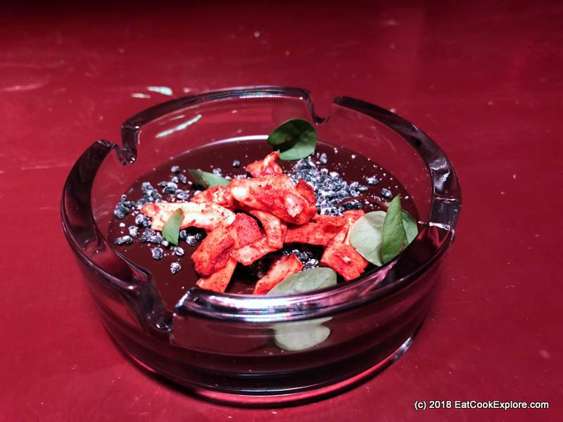 70% Guanaja choclate and oilve oil ganache, sesame ash, coconut bacon flakes and vanilla smoked salt, served in an ashtray 70% Guanaja choclate and oilve oil ganache, sesame ash, coconut bacon flakes and vanilla smoked salt, served in an ashtray