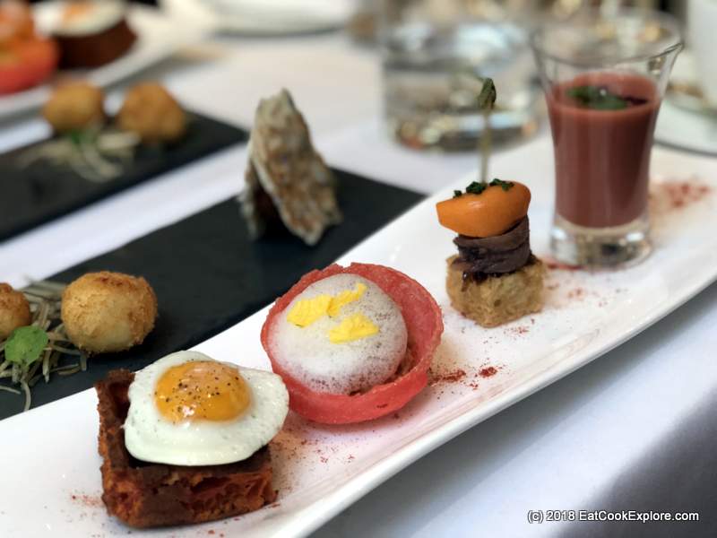 Savoury waffle with a little quails egg, Txangurro spider crab, tomato and raspberry soup The Halkin Afternoon Tea Savoury waffle with a little quails egg, Txangurro spider crab, tomato and raspberry soup