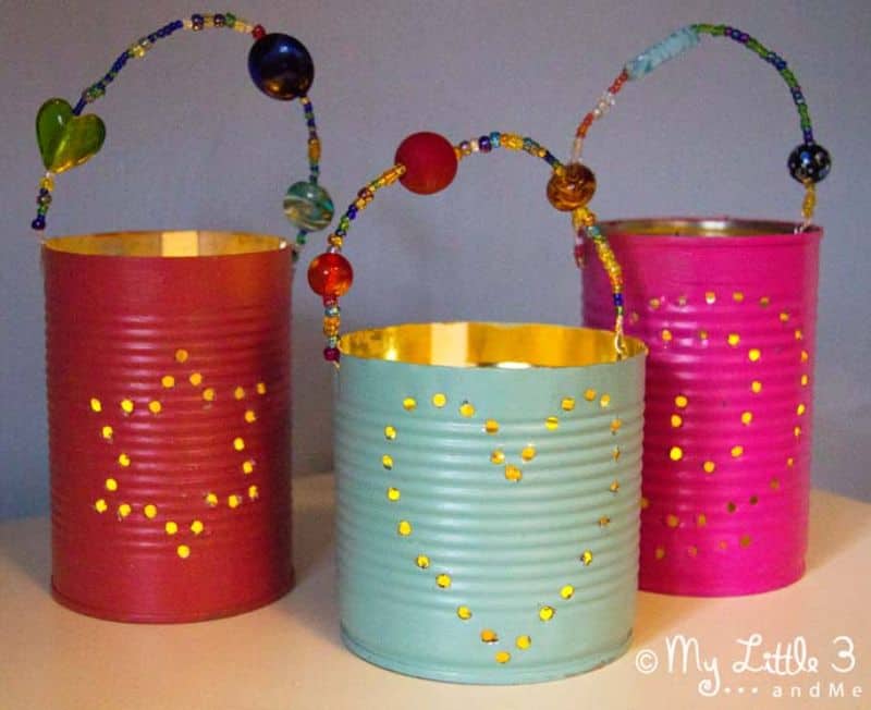 three tin can lanterns