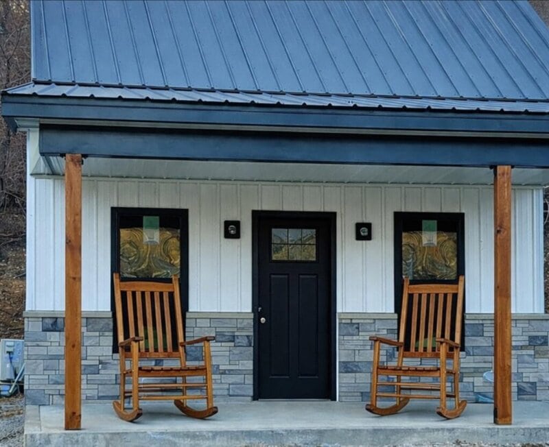 Cottage front porch with rocking chairs at Romaine Valley Weddings & Events in Fenton, Missouri