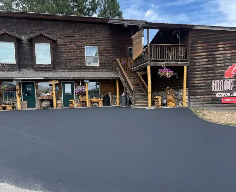 Asphalt sealcoated
