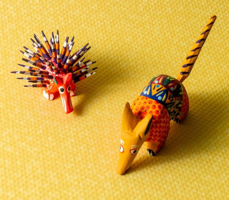 small colorful alebrijes statues, which are a hybrid animal