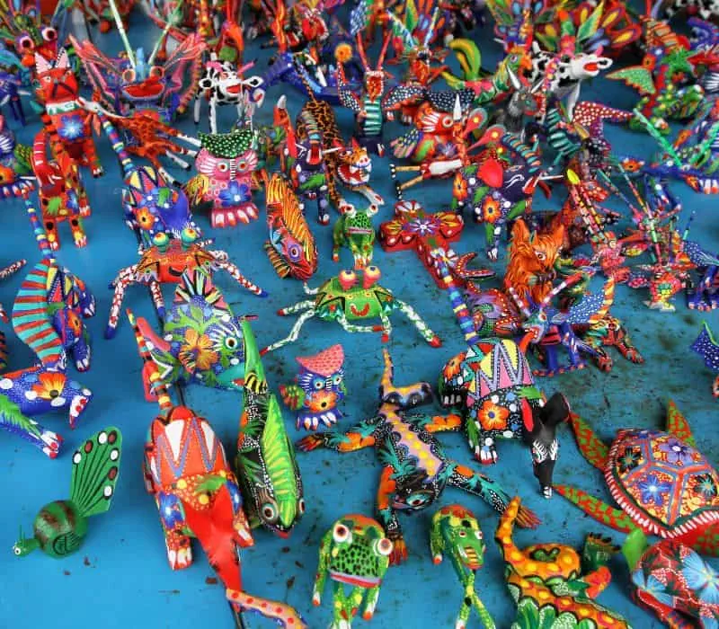 small colorful alebrijes statues, which are a hybrid animal