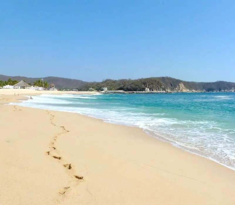empty chahue beach in huatulco mexico, oaxaca state