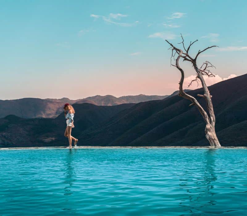 woman at the pools in hierve el agua in oaxaca mexico
