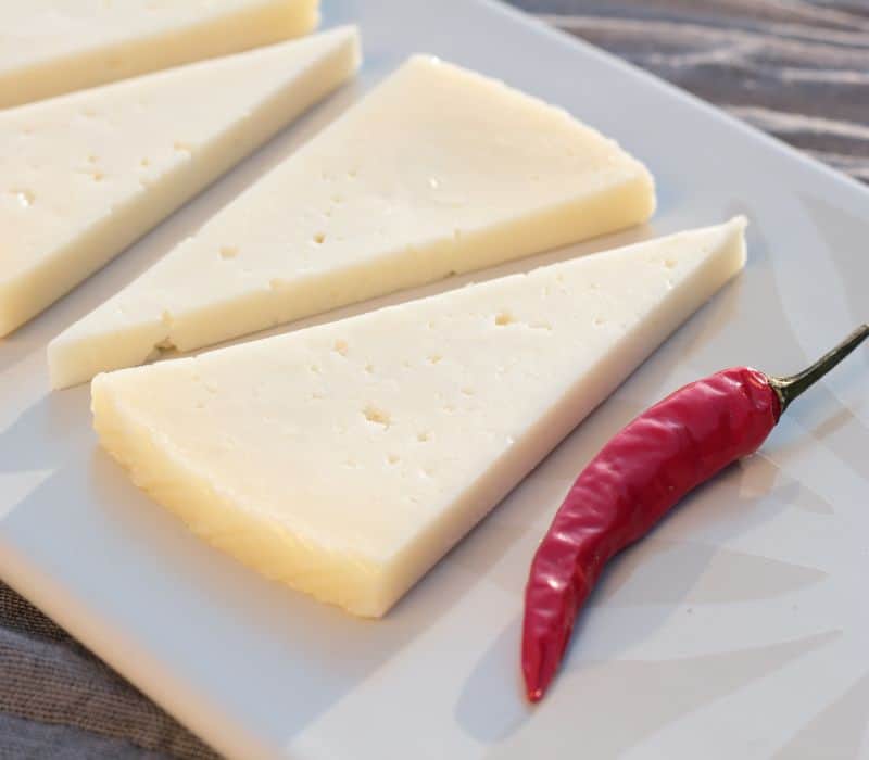 manchego cheese, which can be used as a oaxaca cheese substitute