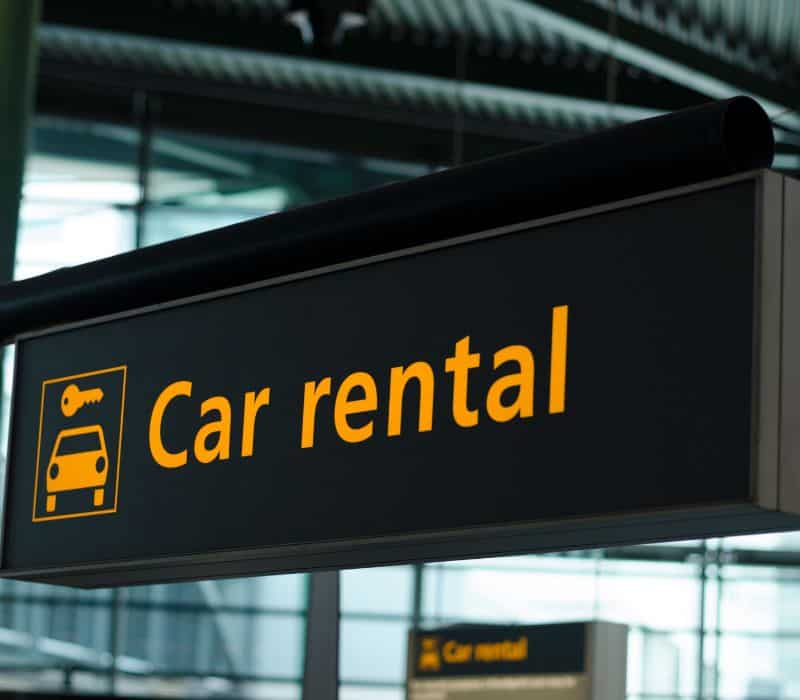 car rental sign at oaxaca airport in mexico