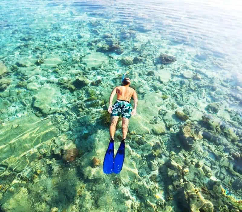 man snorkeling in oaxaca mexico