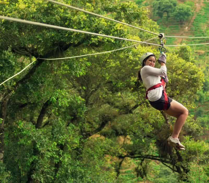 woman on zipline in huatulco mexico | hagia sofia eco park