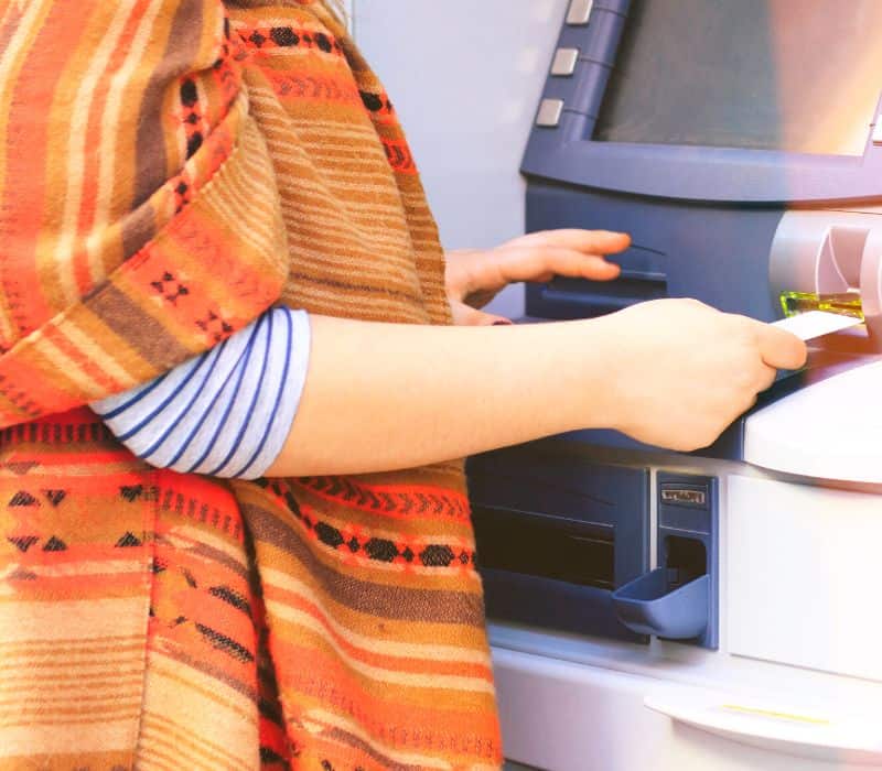 woman using an ATM