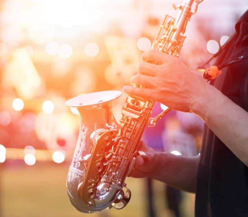 man playing the saxophone at the Mazunte Jazz Festival, one of the best things to do in Mazunte Mexico