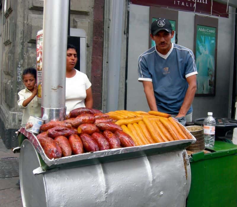 camote vendor in mexico serving some of the best street food in oaxaca city