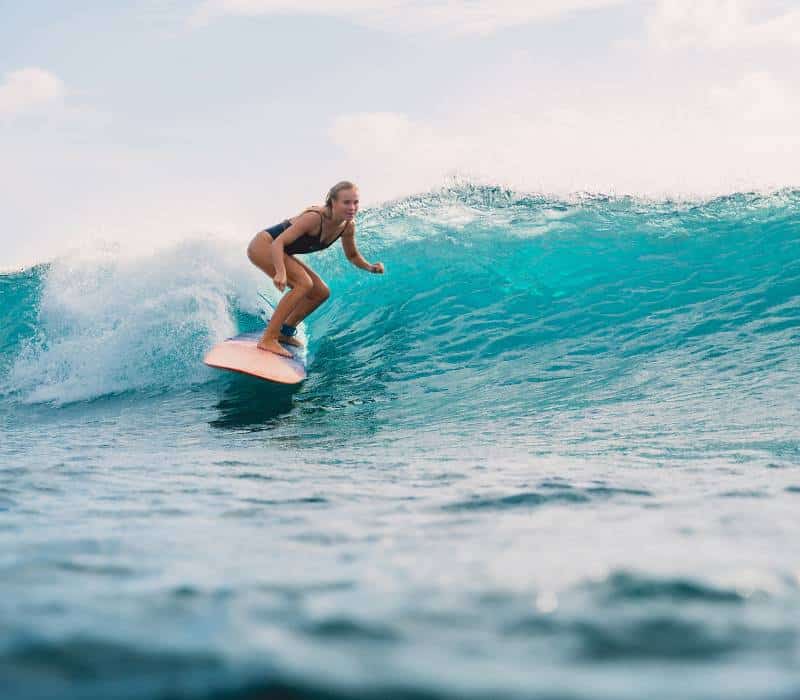 woman surfing in Oaxaca