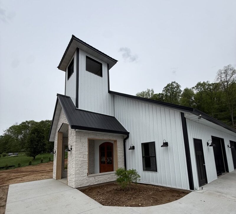 Front exterior view of the Romaine Valley chapel with bell tower