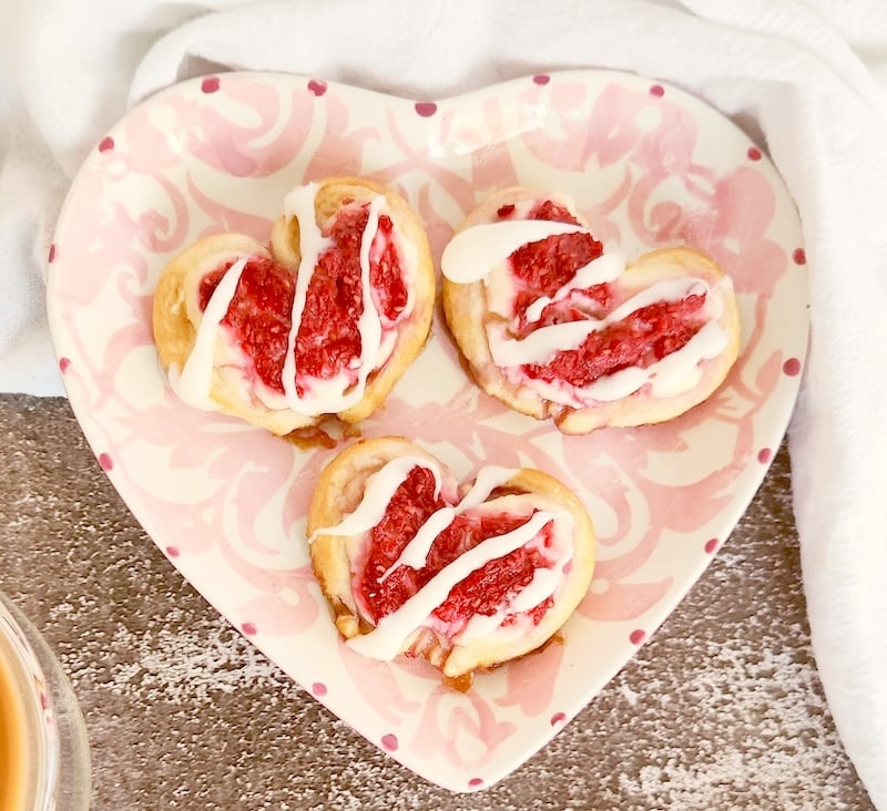 This Shortcut Raspberry Cream Cheese Danish recipe is so easy and quick - your family will think it was made in a bakery!
