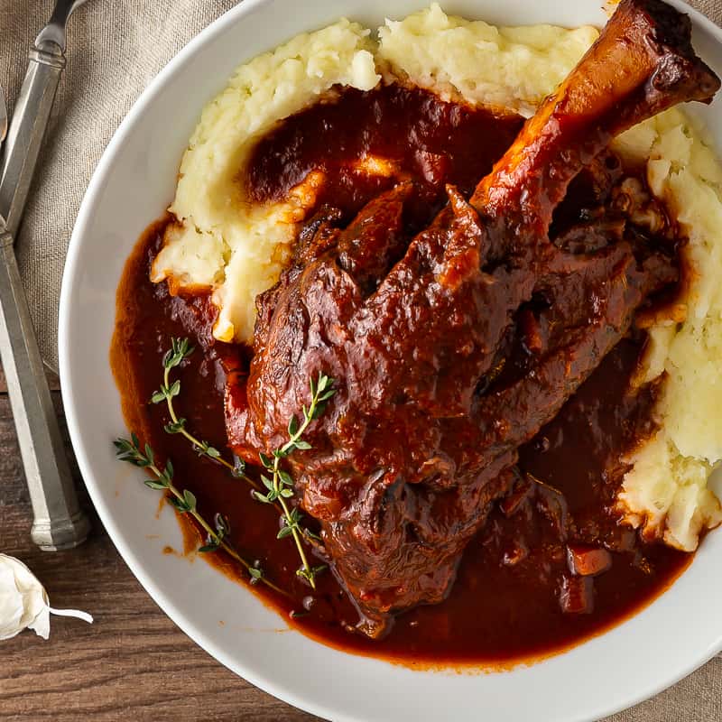 red wine braised lamb shank over mashed potatoes