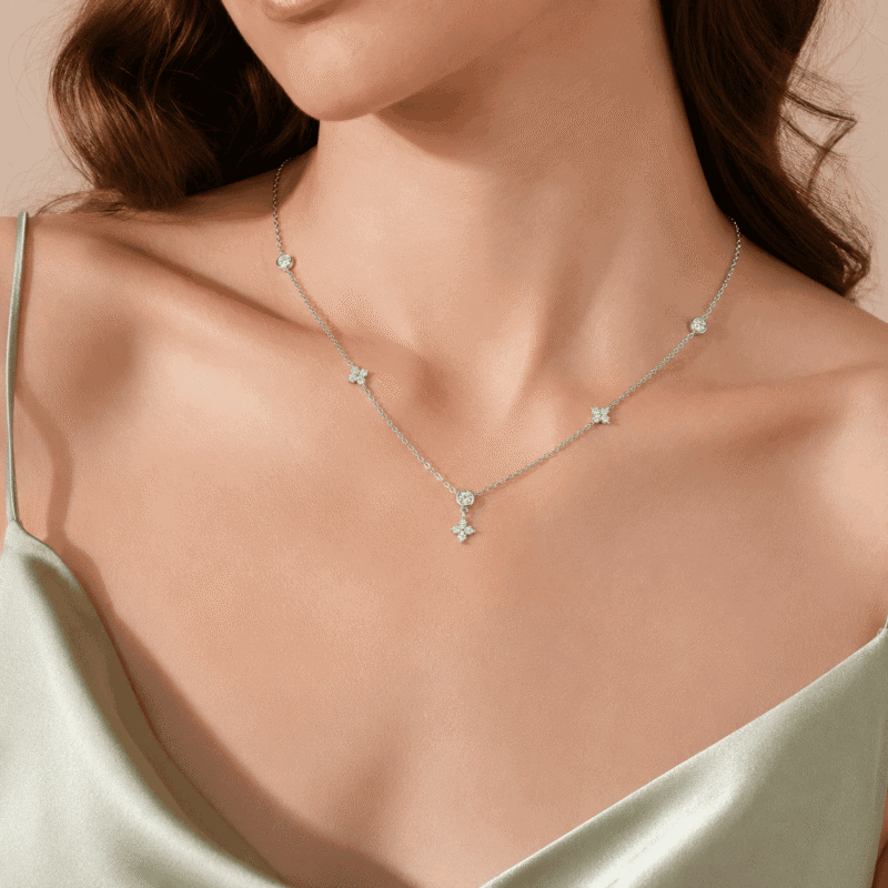 Woman wearing the silver Valenne Clover Choker with delicate moissanite stations by GLAMAVERA