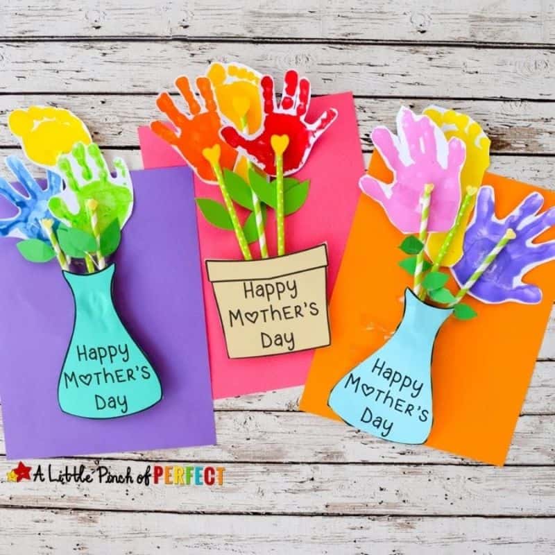 colorful handprint flowers in paper vases