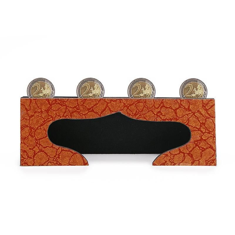 Soporte para monedas que desaparecen