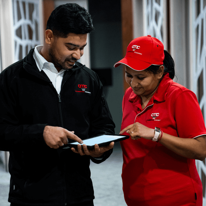 Site Supervisor, Customer Service Manager reviewing cleaning standards with cleaner on site 