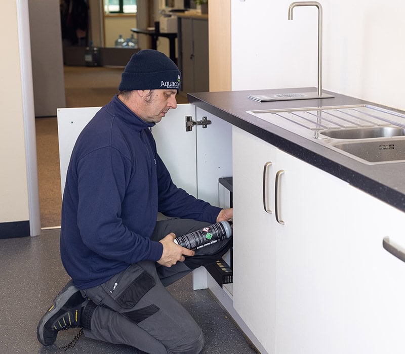 Aquacool maintenance engineer fixing commercial boiling water tap