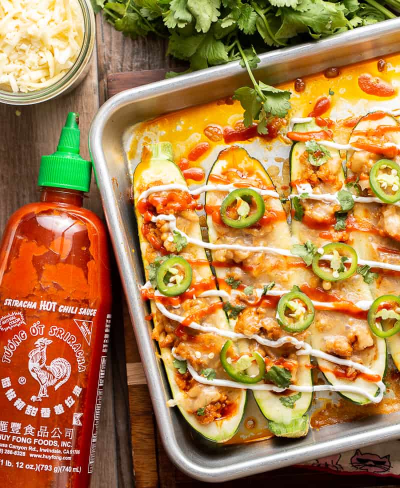 Stuffed Zucchini Boats with Sriracha Bottle