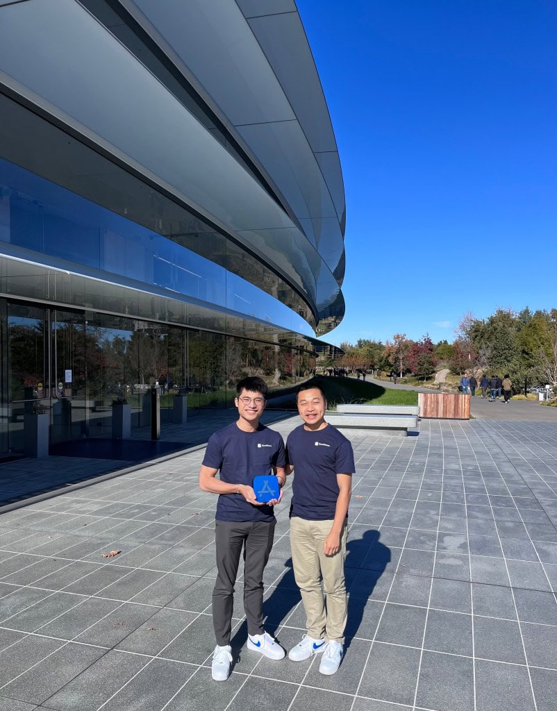 Steven Chan Founder and CEO and Minh Tran COO outside of Apple Park with the 2022 iPad App of the Year Award AmChamHK e-magazine