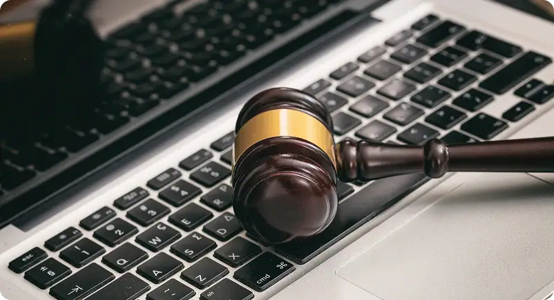 The gavel is on the laptop