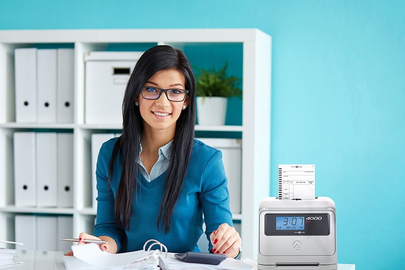 Woman with glasses calculates tax