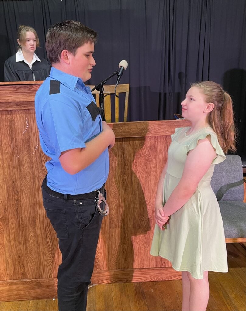 Order in the Court cast members at Martin Luther School