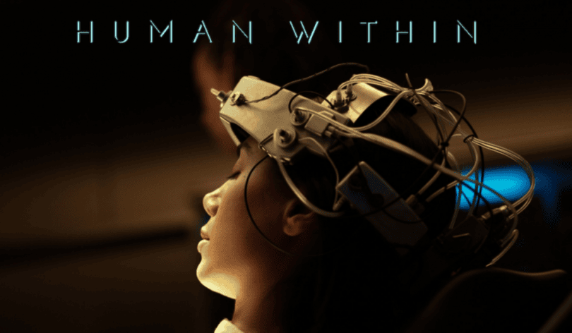 Official key art for Human Within. Text Reads "Human Within" A woman appears to be strapped into some sort of electronic device with wires around her head. Her eyes are closed.