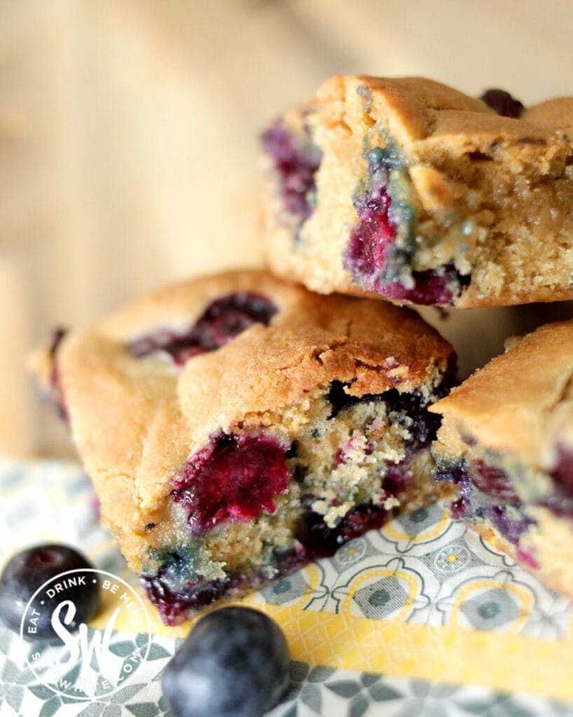 Blueberry Cookie Traybake slices stacked up