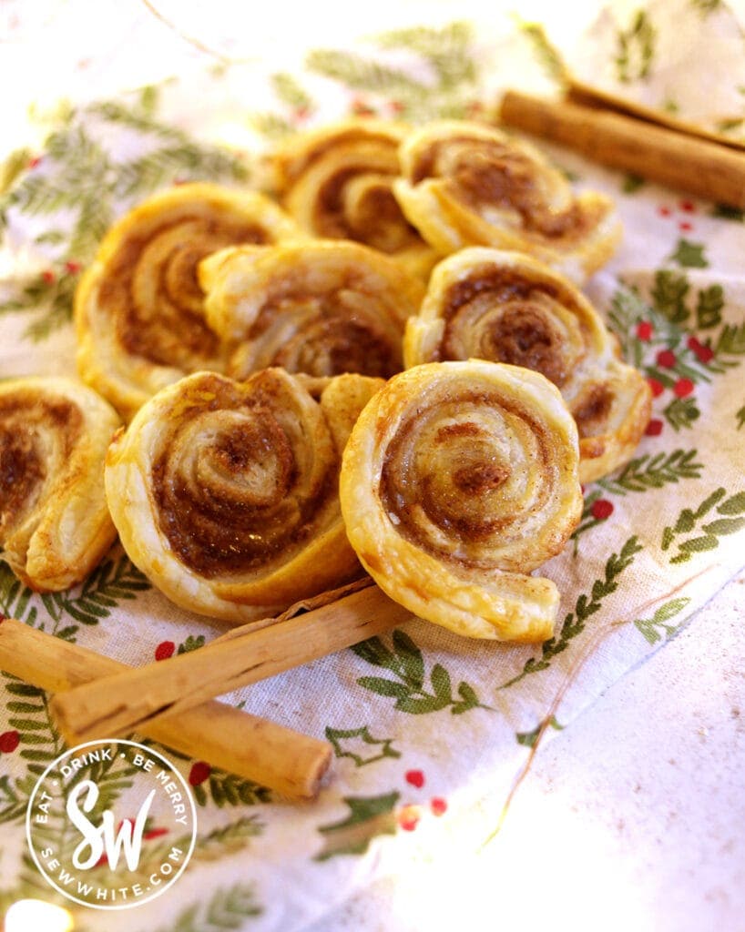 cinnamon puff pastry swirls on a Christmas napkin