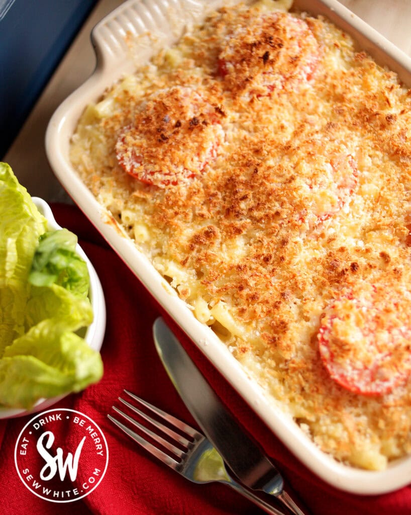 freshly made Creamy baked mac and cheese recipe with a side salad