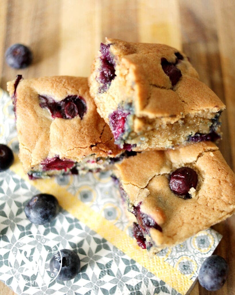 Blueberry Cookie Traybake squares stacked up