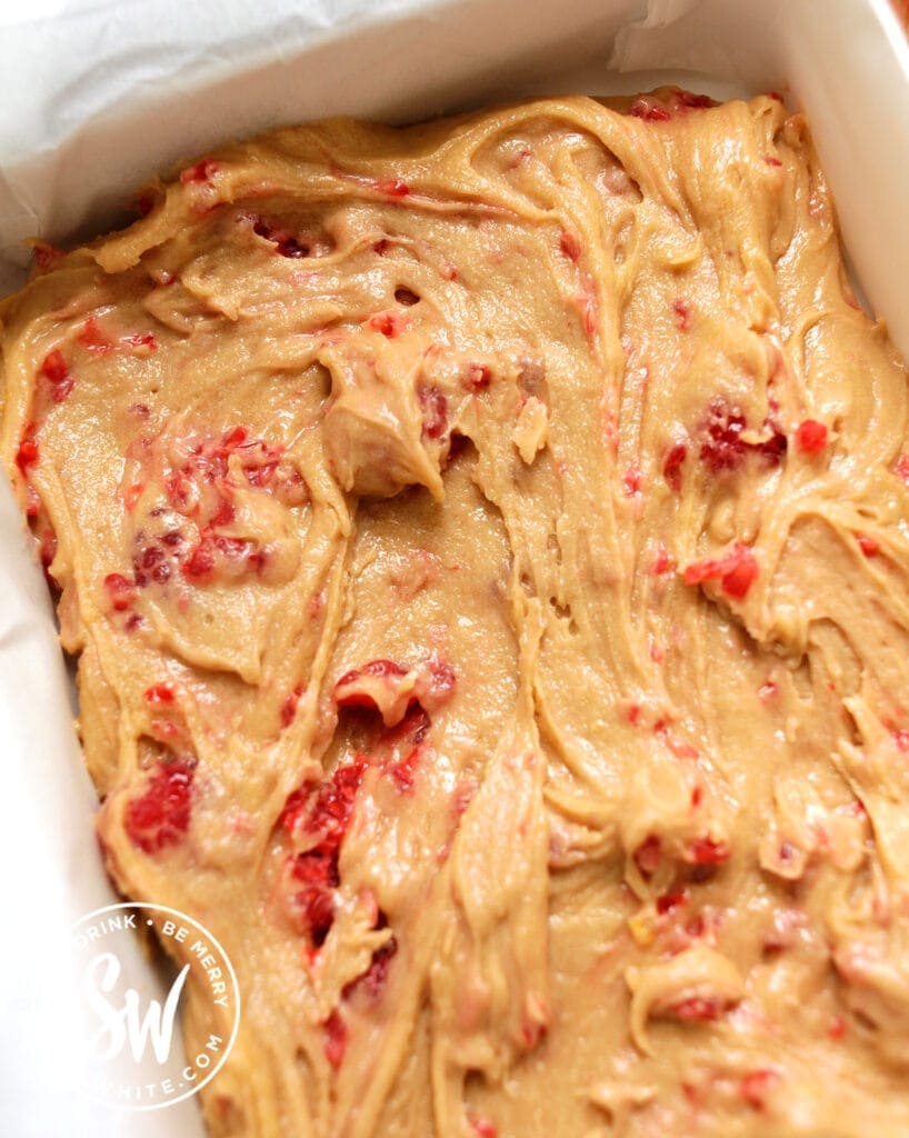 raspberry lemon blondies dough ready for the oven