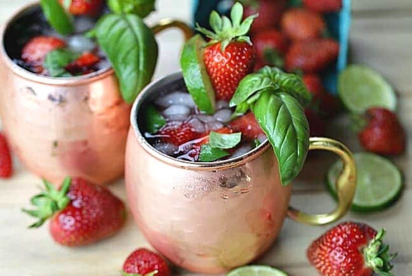 This simple Strawberry Basil Moscow Mule is a refreshing drink recipe. Grab your copper mugs and make this easy cocktail recipe. 