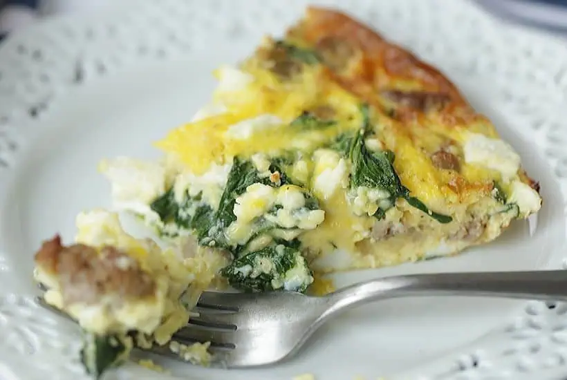 Start your day off right with this Sausage, Spinach and Feta Frittata recipe. This easy frittata recipe is perfect for breakfast or brunch. This make-ahead breakfast option is perfect throughout the week for a quick meal or snack. #frittata #sausagefrittata