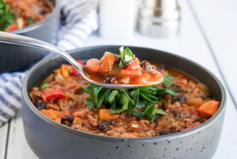 Pumpkin Chili is a delicious twist on the classic chili recipe. This easy chili recipe is made with pumpkin puree, ground beef, beans, and a simple homemade blend of chili seasonings.