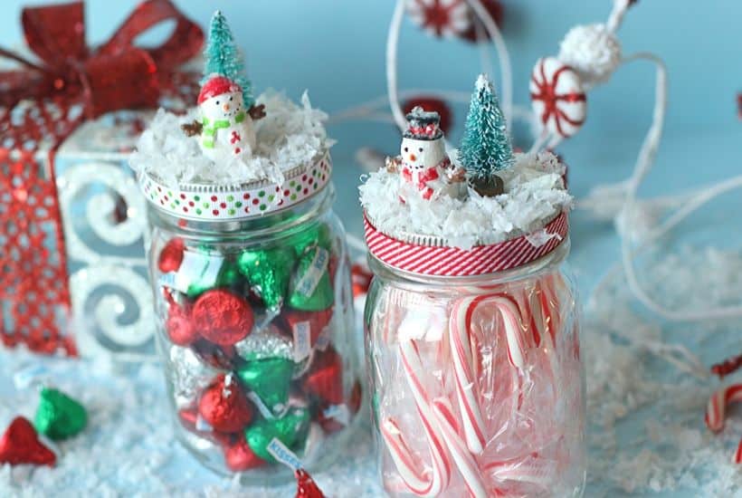 Spread some sweet cheer to friends and family with these DIY Christmas Mason Jar Gifts. Fill these treat jars with Christmas candy or a favorite snack. Mason jar gifts are easy to make and fun to give. #masonjarcraft #christmasgift #christmasmasonjargift