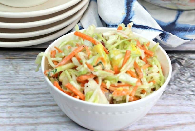 This Hawaiian Coleslaw recipe (or pineapple slaw) is zesty, crunchy and balanced with sweet pineapple flavor. This easy slaw recipe is a tasty twist on the classic coleslaw.