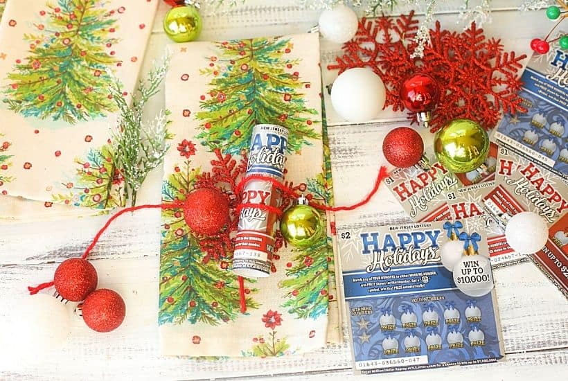 Share some lottery luck with your dinner guests this holiday season. These easy NJ Lottery Ticket DIY Christmas Napkin holders are a fun way to decorate your holiday dinner table.