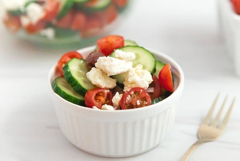 If you’d like a light and refreshing side dish, try this Greek Salad. It consists of healthy ingredients that are good for you, including cucumbers and red onions. This is an easy salad recipe to serve as a simple side dish, potluck recipe or at a summer picnic.